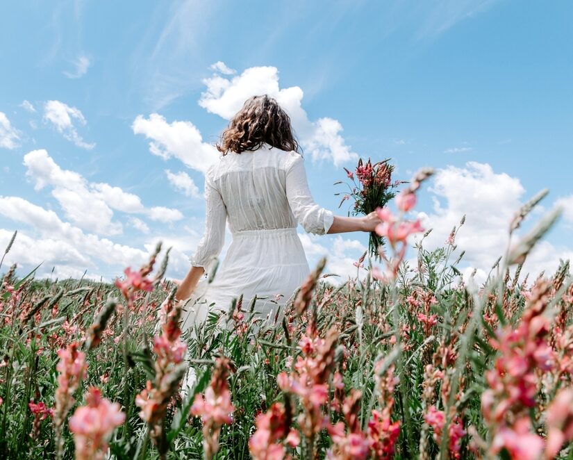 Back,View,Of,Woman,In,Long,White,Dress,With,A